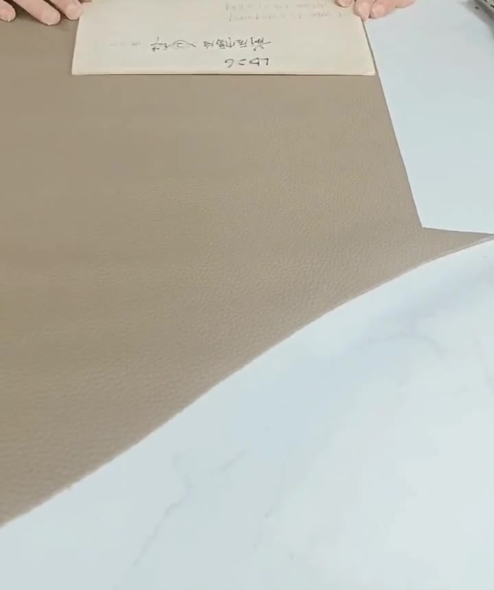 Pebbled genuine leather hide prepared for handbag cutting in Guangzhou